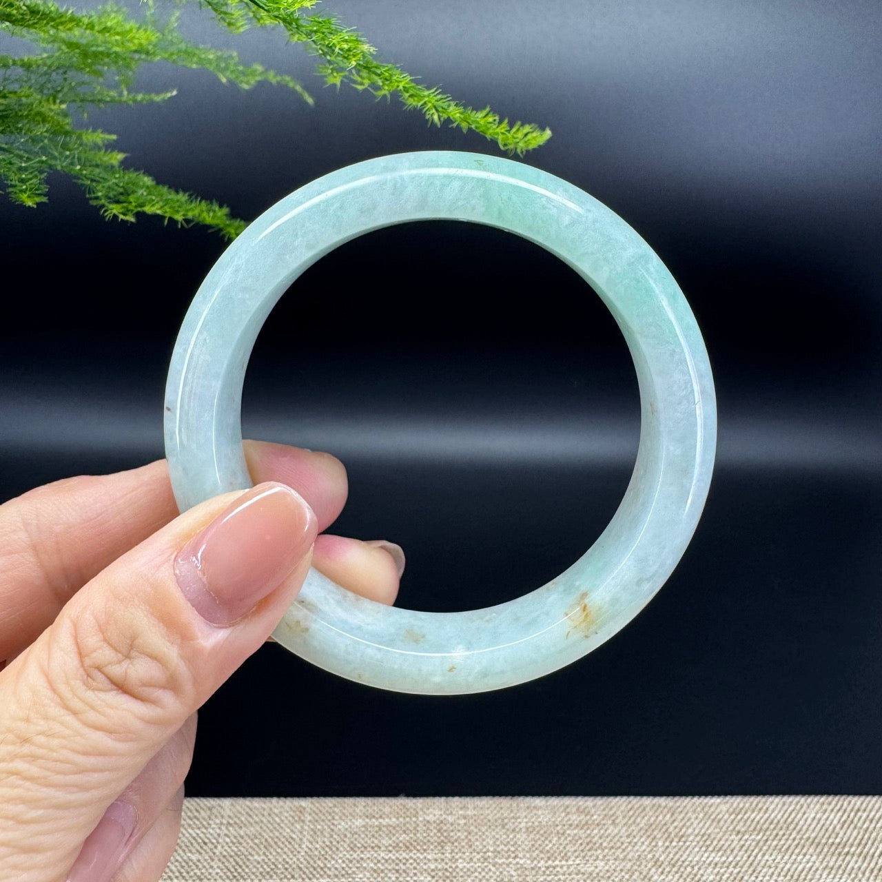 The bangle shape of the half round.The bangle color is yellow green.