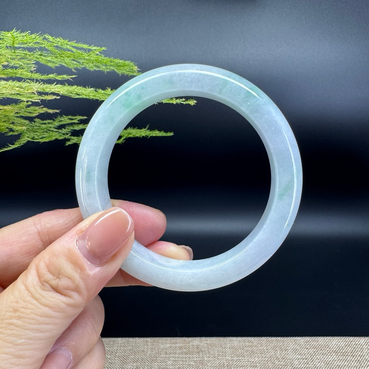 The bangle  shape of the half round.The bangle color is lavender green.