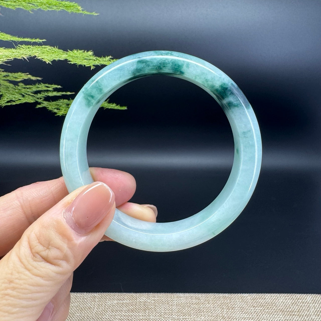 The bangle shape of the half round.The bangle color is icy green flower.