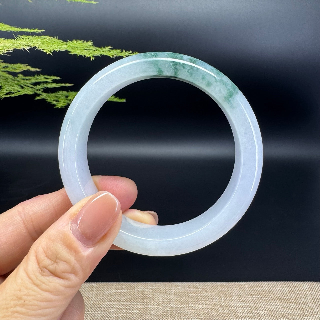 The bangle shape of the half round.The bangle color is icy lavender green.