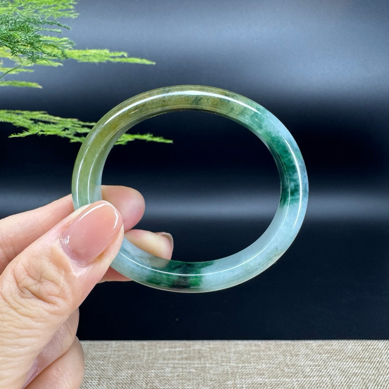 The bangle shape of the half round.The bangle color is yellow green.