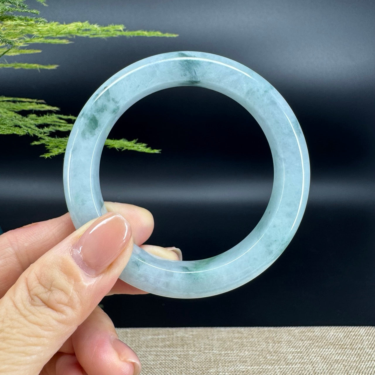 The bangle shape of the half round.The bangle color is icy blue flower.