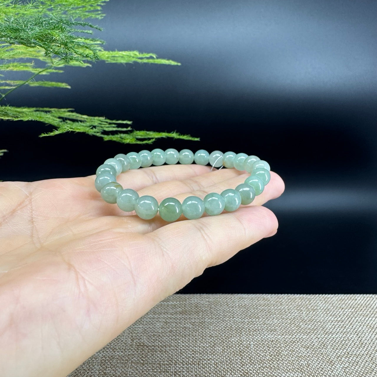 The beads shape of the round.The beads color is green.