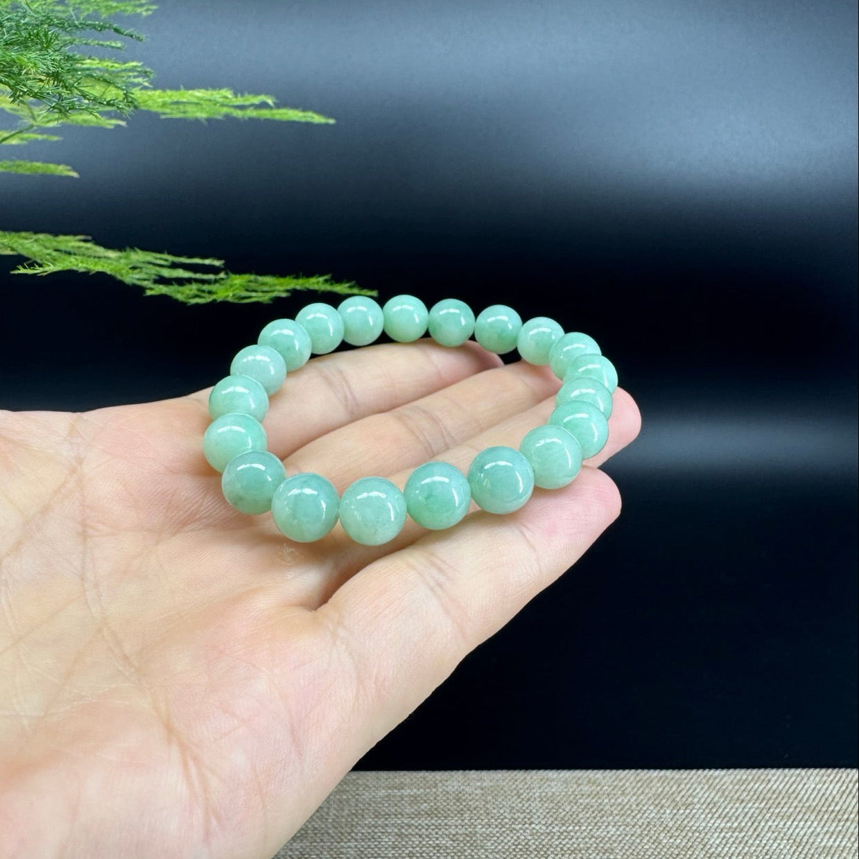 The beads shape of the round.The beads color is apple green.