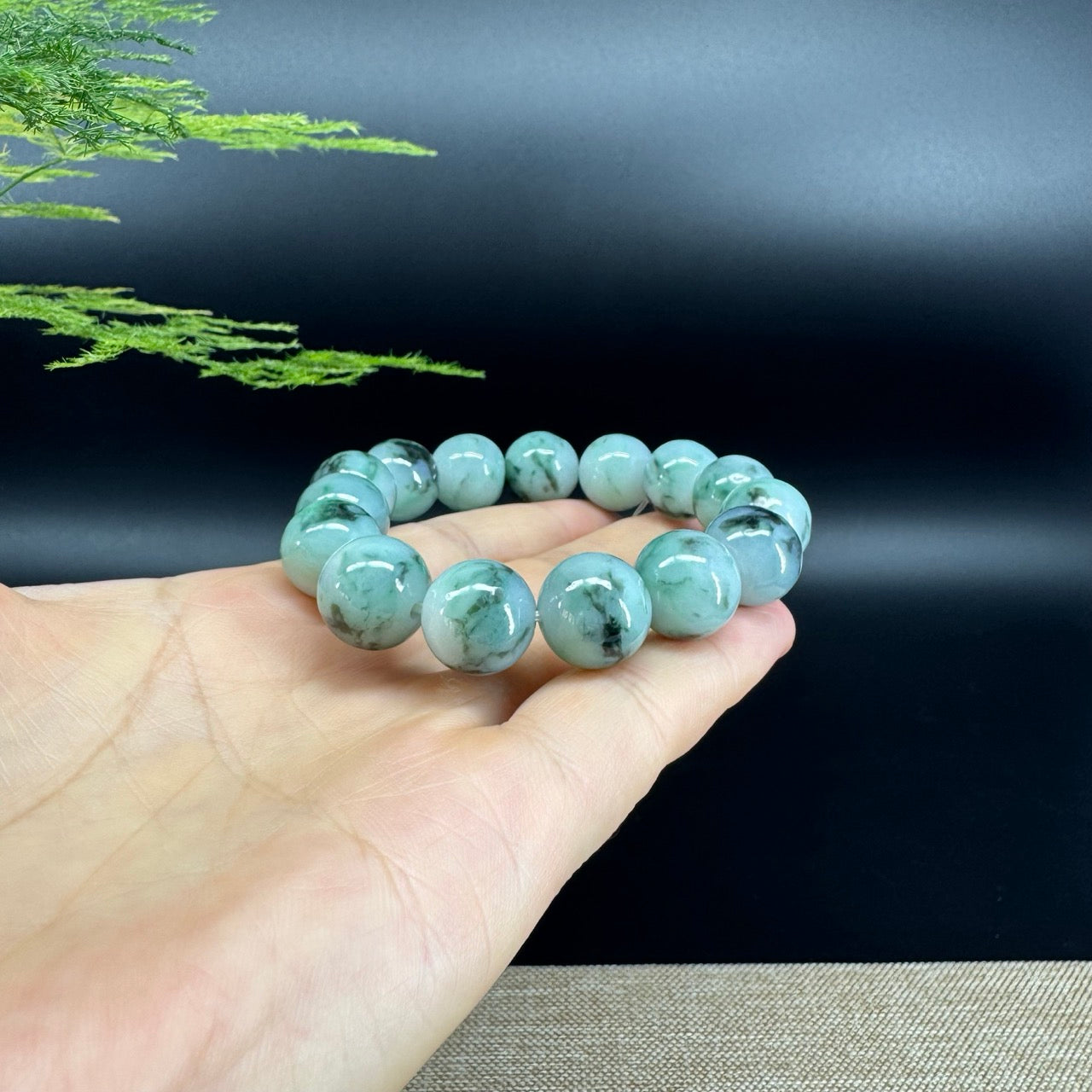 The beads shape of the round.The beads color is icy blue green.