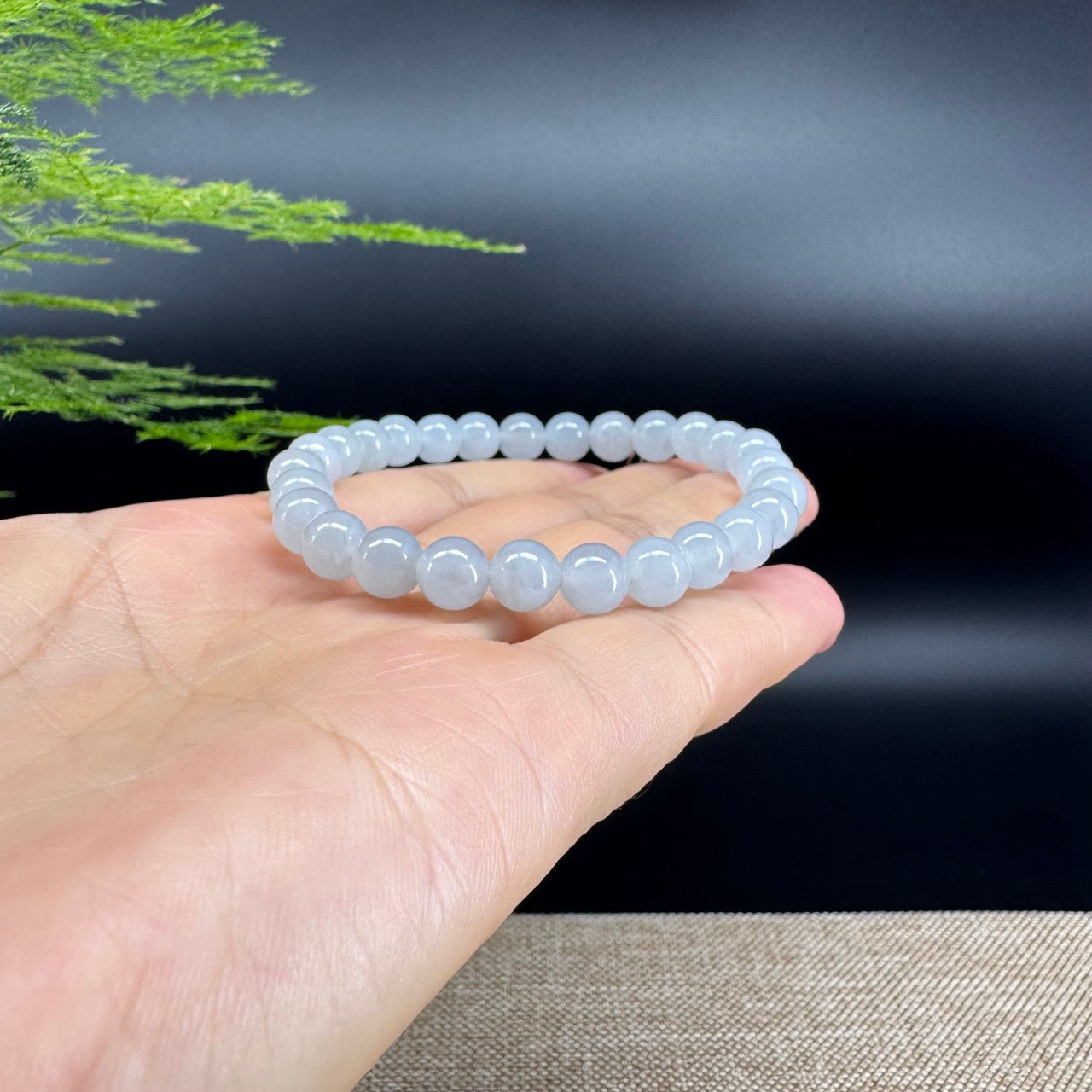 The beads shape of the round.The beads colors are light lavender.