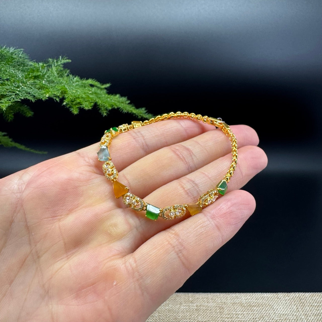 The bracelet shape of the polygon.The bracelet color is multicolor.