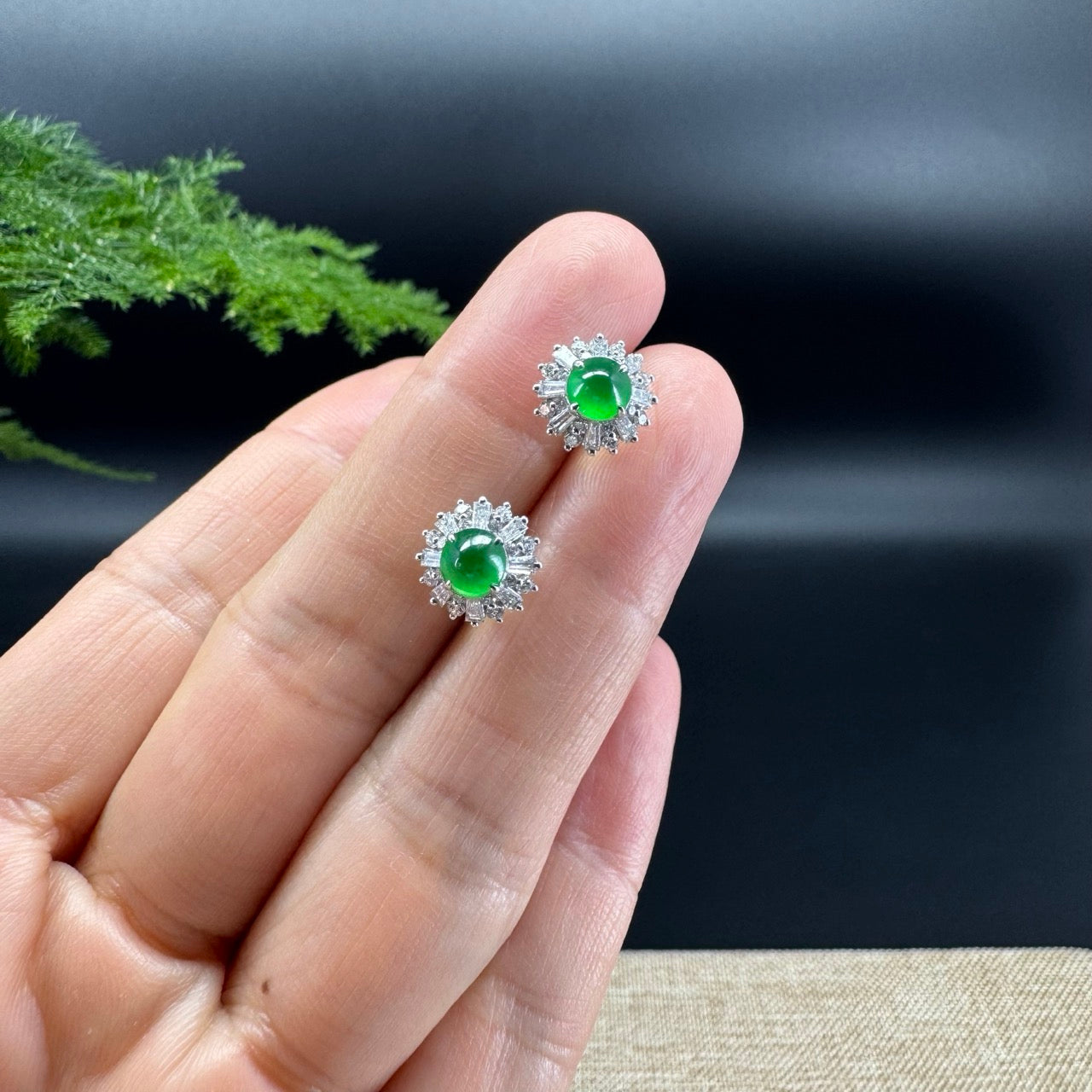 The earring shape of the flower.The jade color is imperial green.