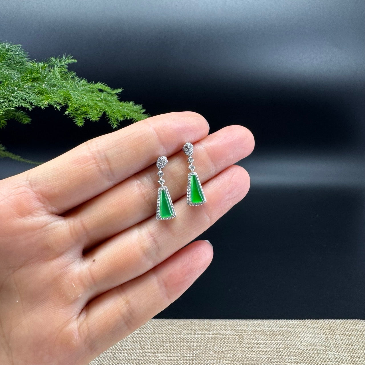 The earring color is imperial green