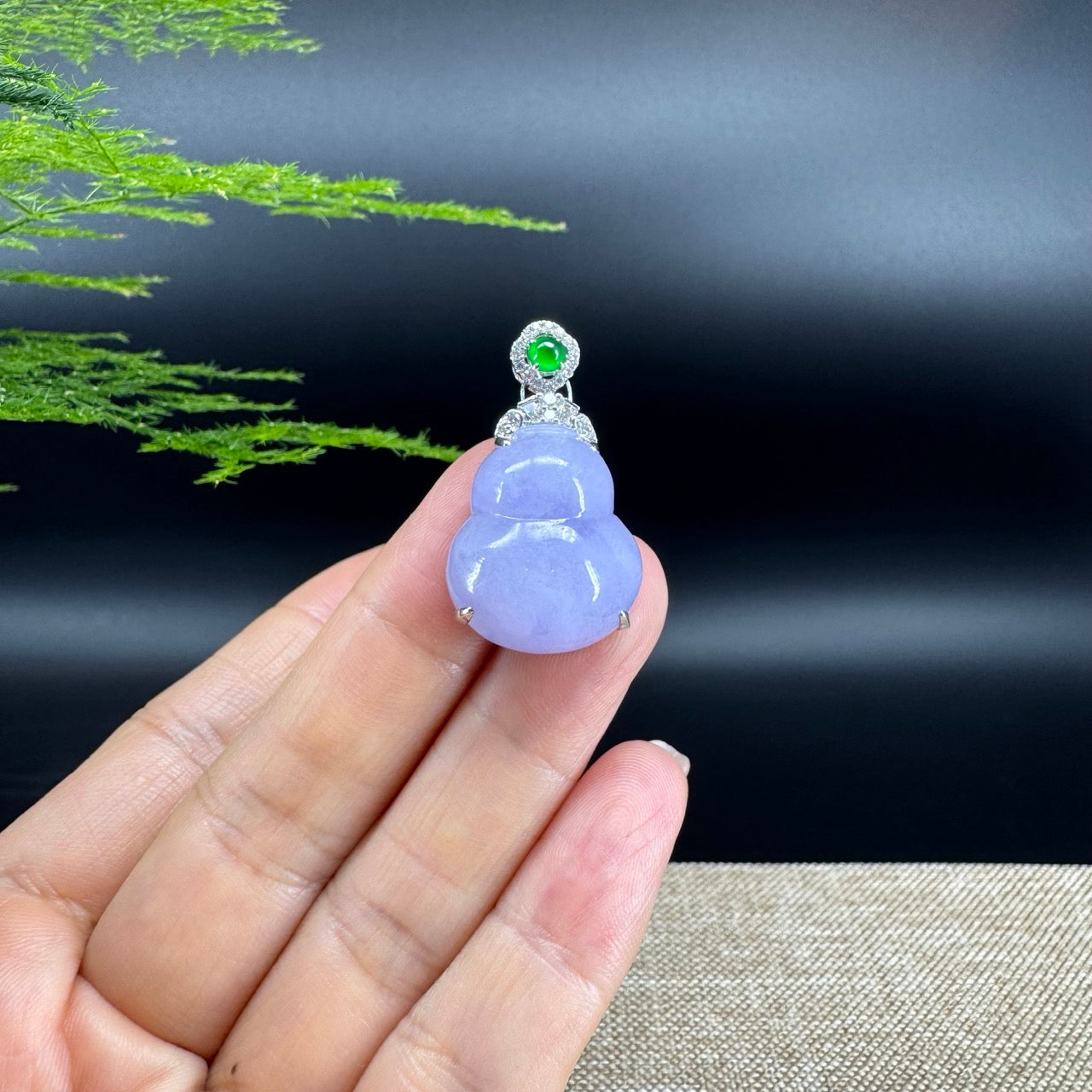 The pendant shape of the hulu.The pendant color is lavender.