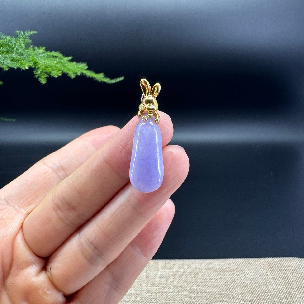 The pendant shape of the eggplant.The pendant color is lavender.