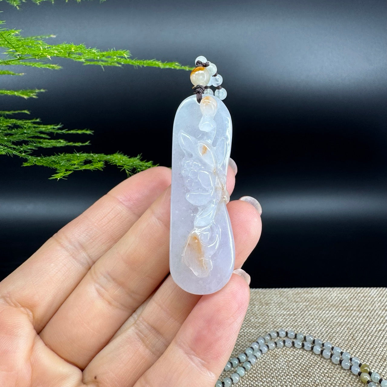 The pendant shape of the lotus.The pendant color is yellow lavender.