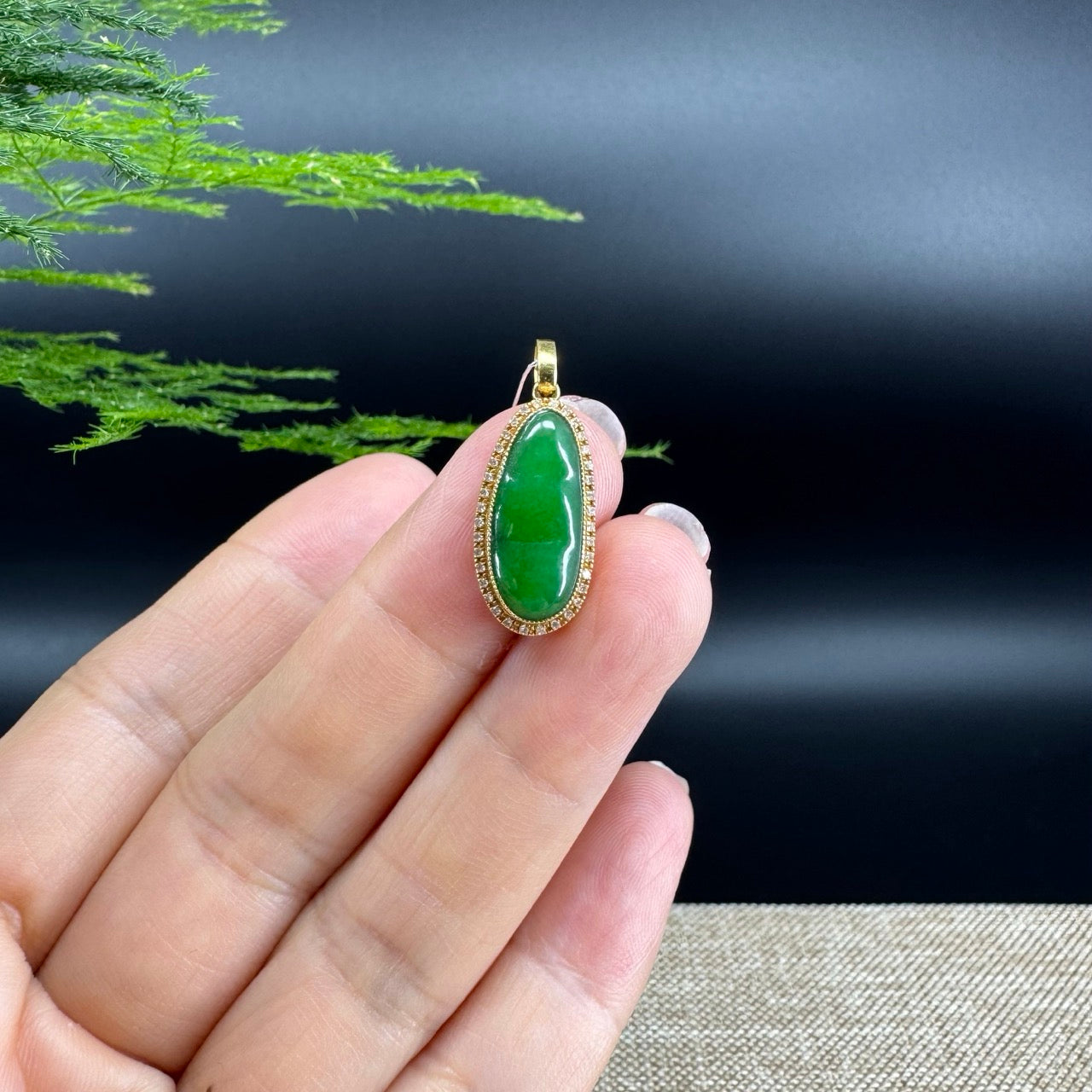 The pendant shape of the beads.The pendant color is imperial green.