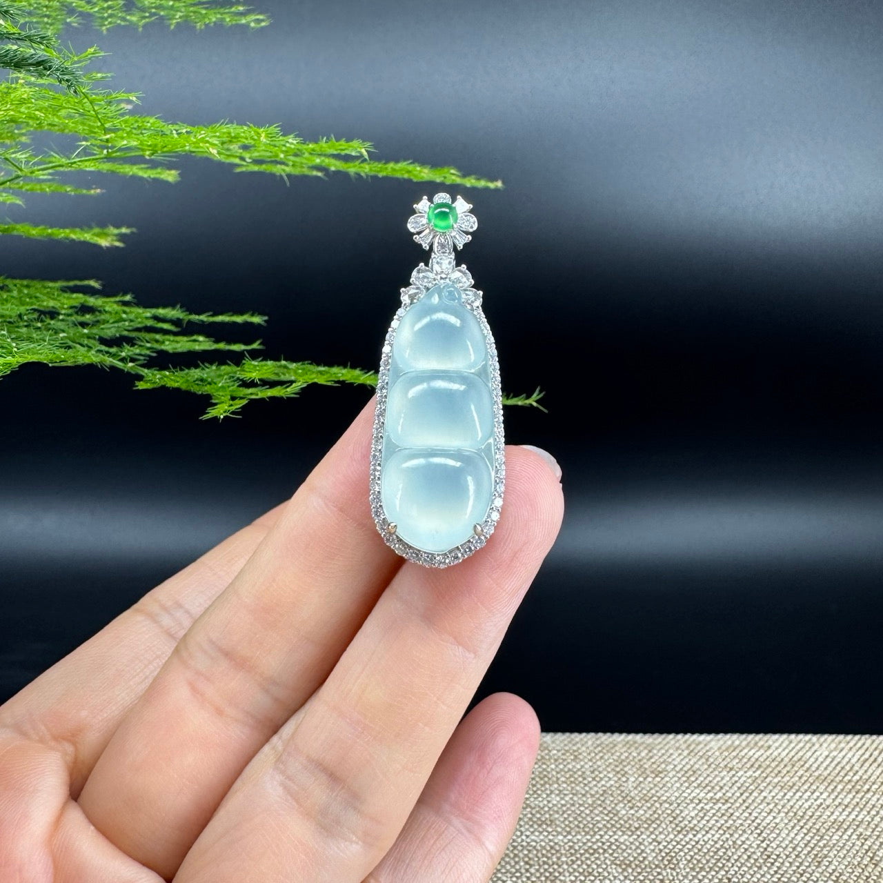The bangle shape of the pendant.The bangle color is icy.