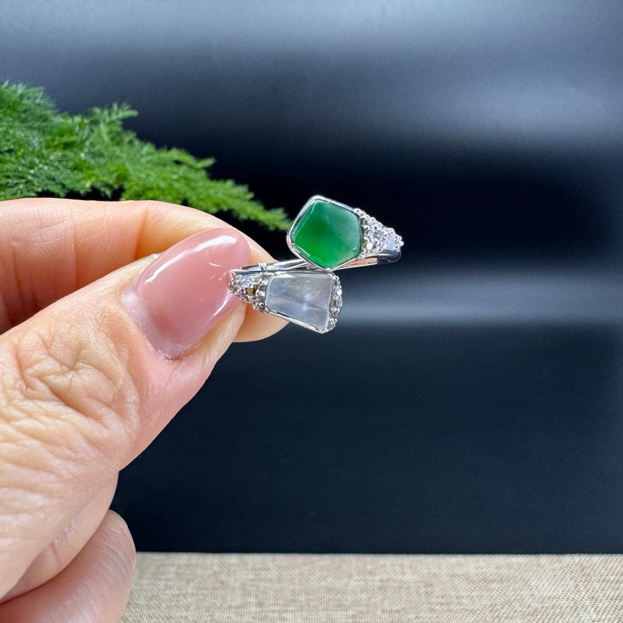 The shape of the ring is irrgular.The ring colors are icy and green.