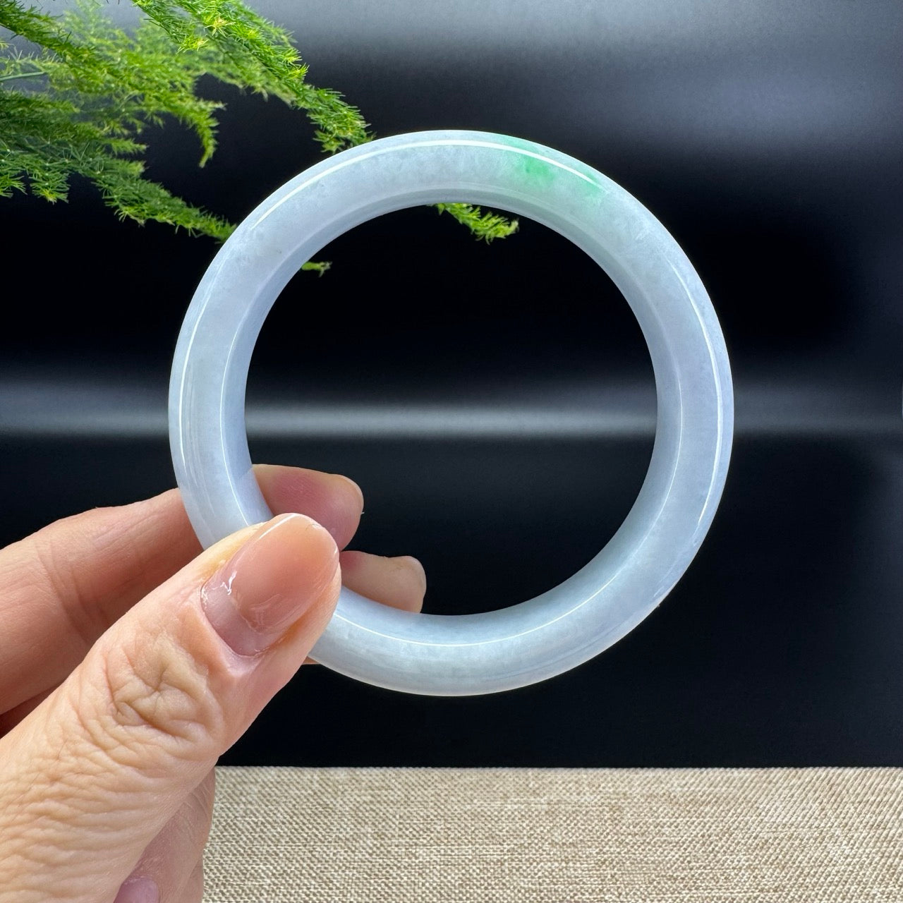 The bangle shape of the half round.The bangle color is lavender green.
