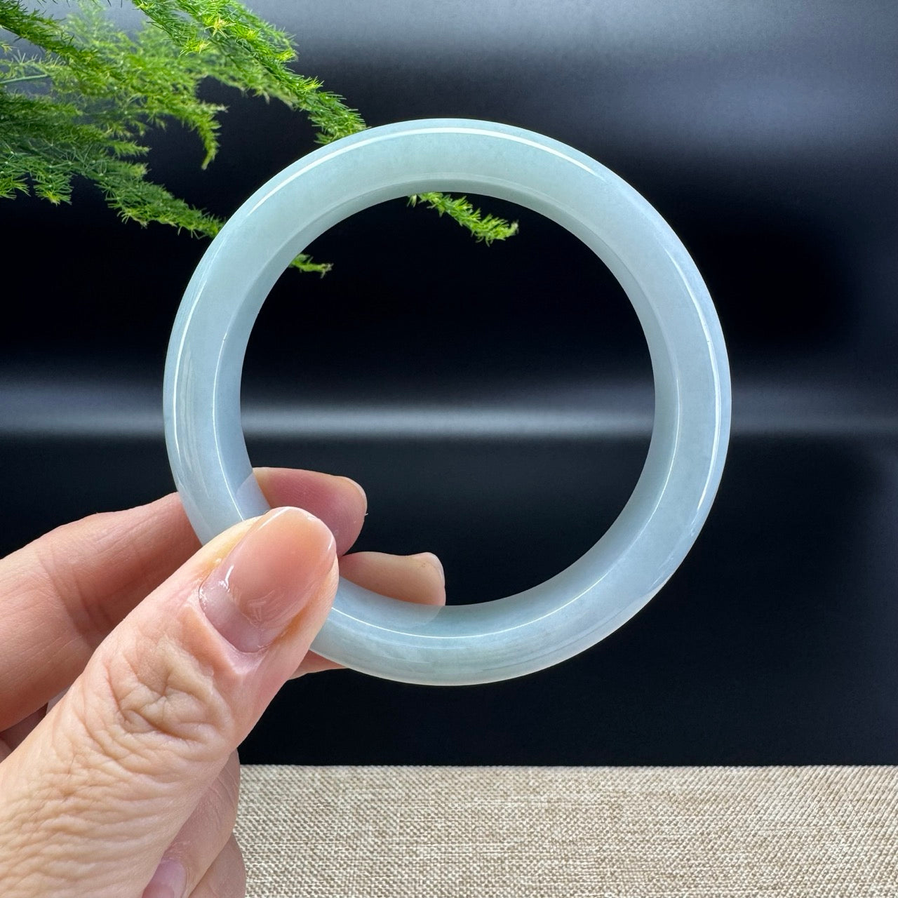 The bangle shape of the half round.The bangle color is lavender green.