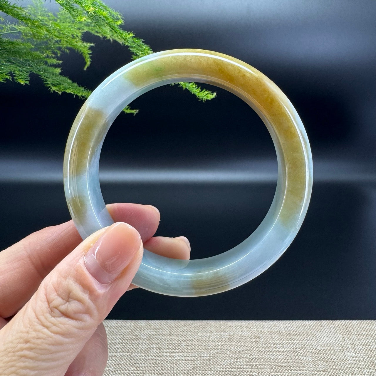The bangle shape of the half round.The bange color is yellow green.