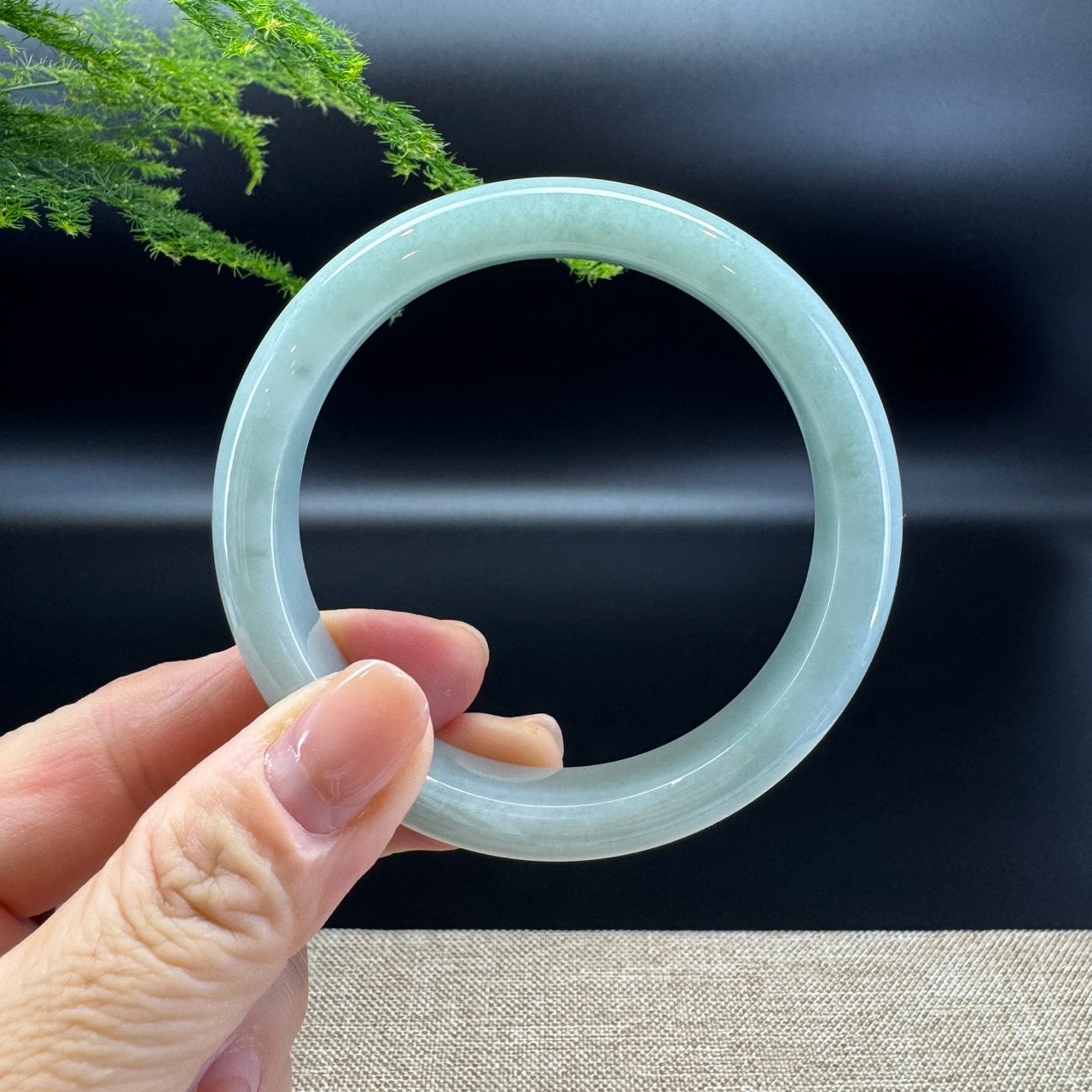 The bangle shape of the half round.The bangle color is apple green.