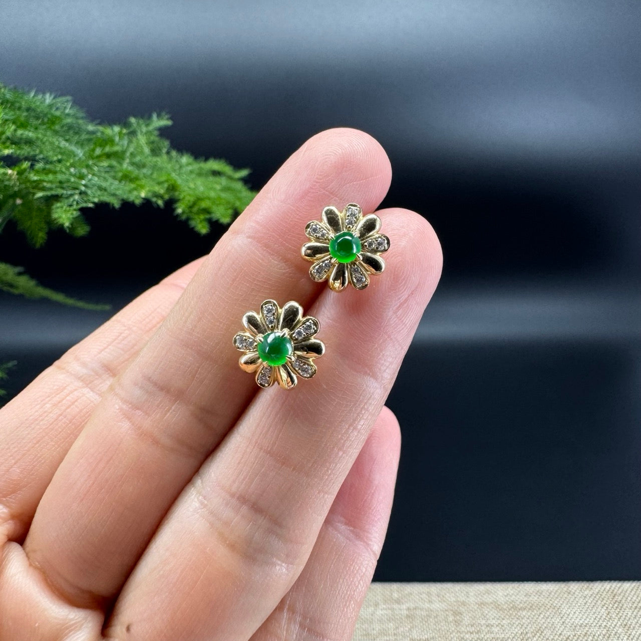 The earring shape of the flower.The jade color is imperial green.