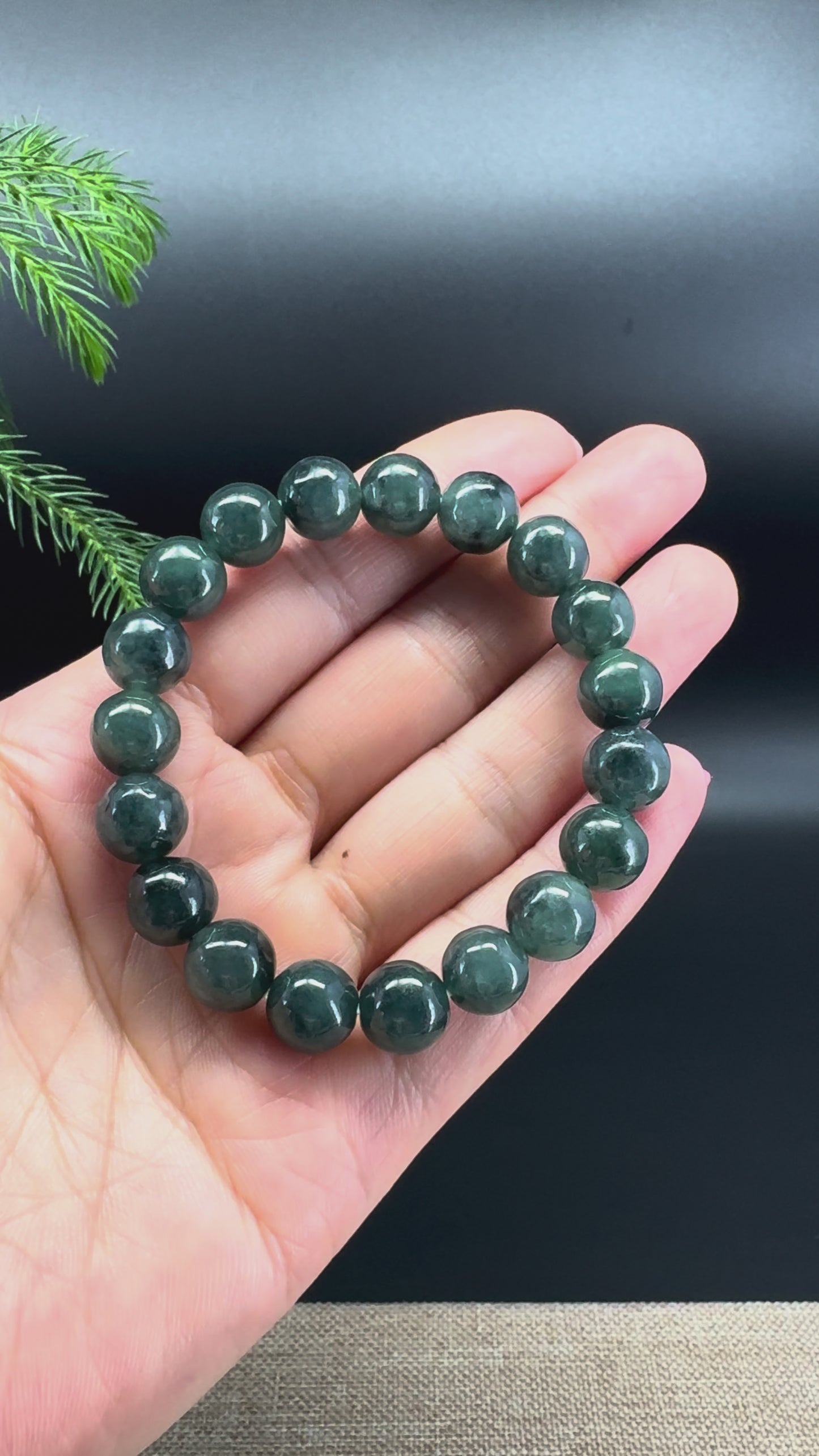 Load and play video in Gallery viewer, RealJade® Genuine Jadeite Jade Round Dark Forest Green Beads Bracelet ( 10mm )
