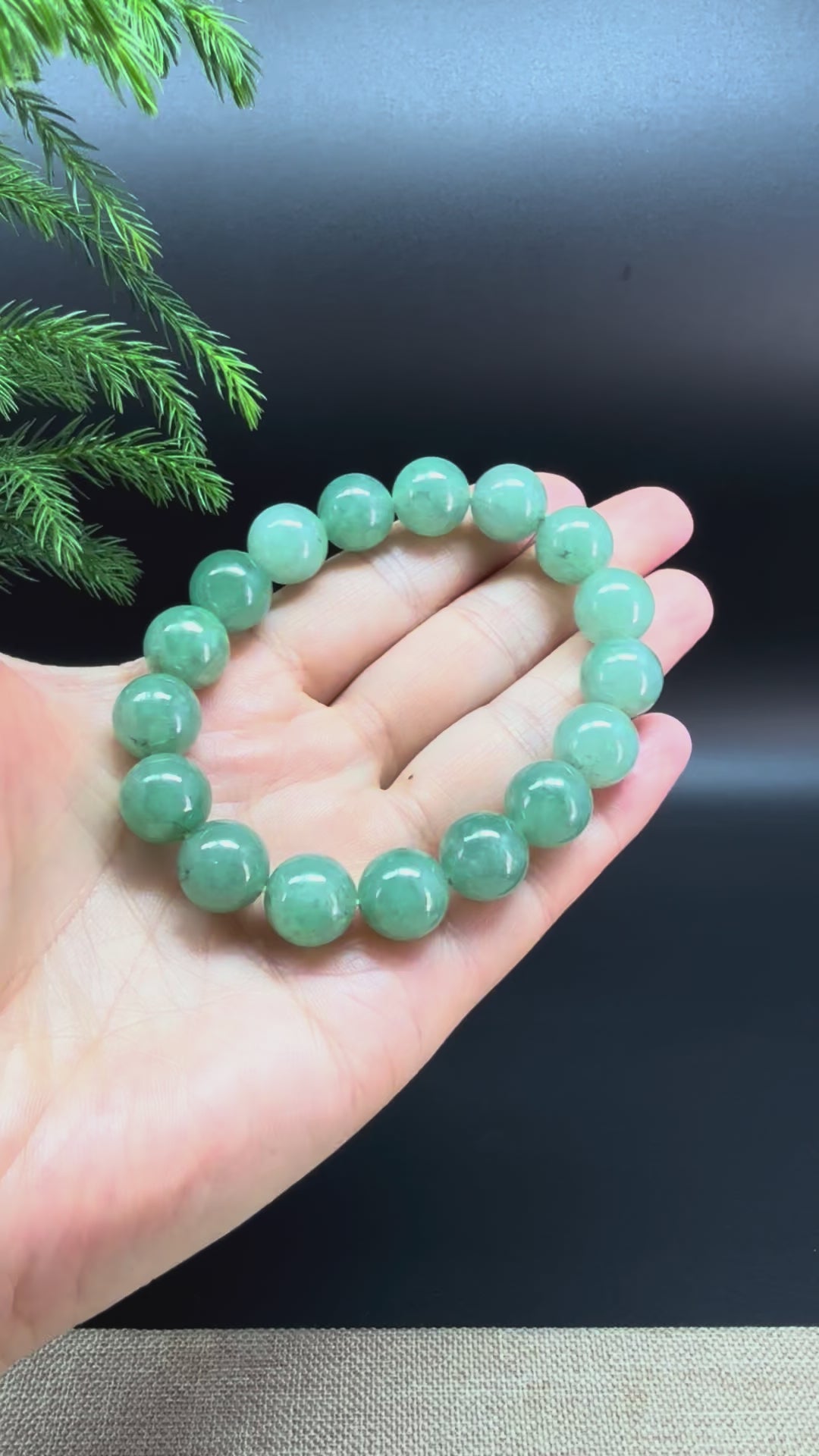 Load and play video in Gallery viewer, RealJade® Co. Genuine Jadeite Jade Round Green Beads Bracelet (12.3mm)
