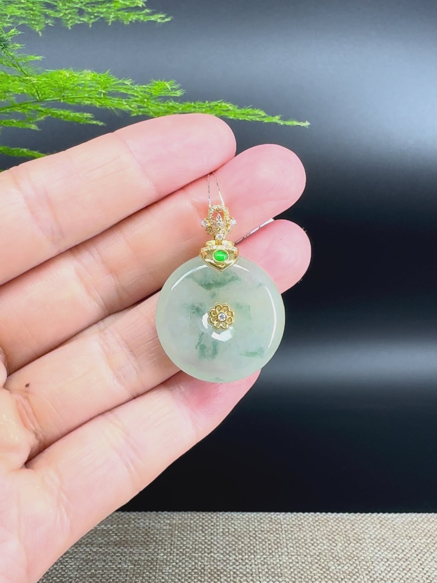 Load and play video in Gallery viewer, &amp;quot;Good Luck Button&amp;quot; icy Green Jadeite Jade Lucky KouKou Pendant With 18K Yellow Gold Bail
